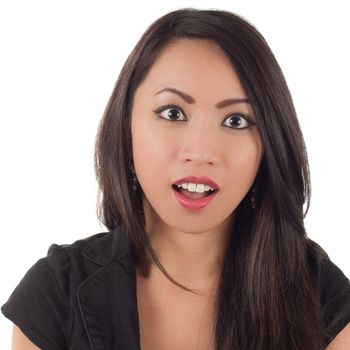 Studio shot of shocked or surprised woman isolated on white