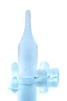 Bottle made from ice and ice cubes isolated on white background with clipping path