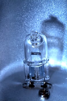 Extreme closeup of small modern halogen light bulb