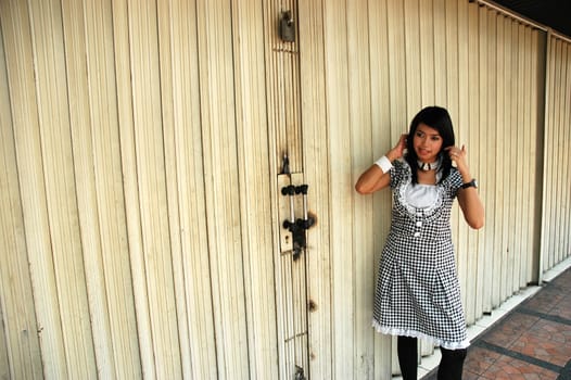 young asian lady wearing nice vintage dress