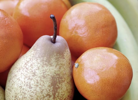 Close up of fruit in bowl on table