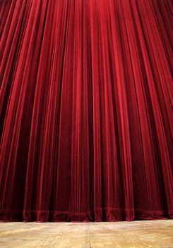 red clean closed velvet curtain, wooden floor, simple scene