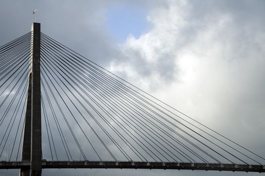 Anzac bridge in Sydney detail, cables and pylon, waving australian flag, 