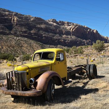 Old abandoned truck in desert landscape of Utah.