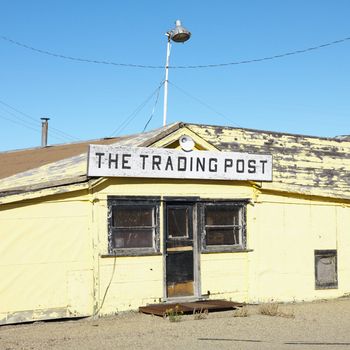 Old trading post in desert landscape of Utah.