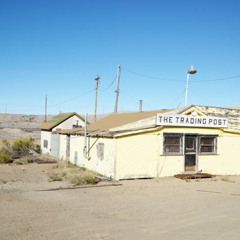 Old trading post in desert landscape of Utah.