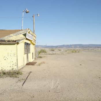 Old trading post in desert landscape of Utah.