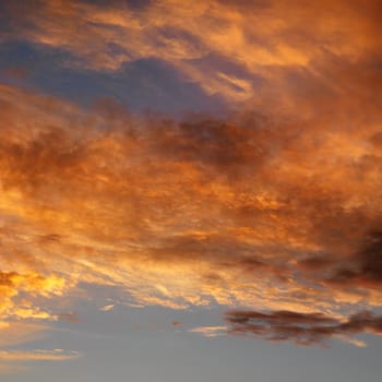 Red clouds in sky with sunset.