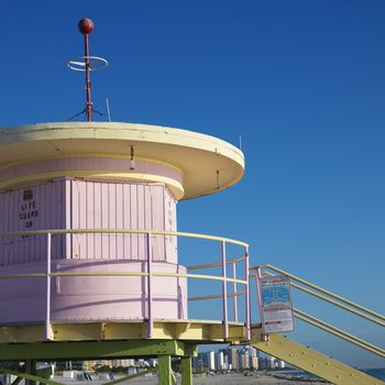 Pink art deco lifeguard tower closed up on beach in Miami, Florida, USA.