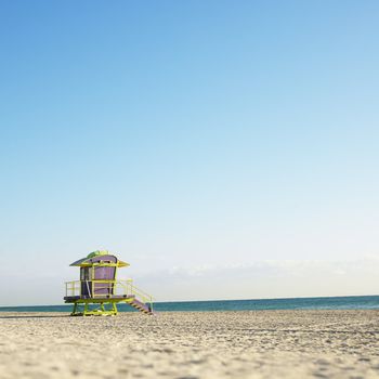 Art deco lifeguard tower on deserted beach in Miami, Florida, USA.