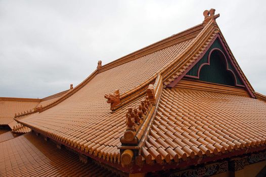 orange roof of buddhist temple in australia, biggest in southern hemisphere