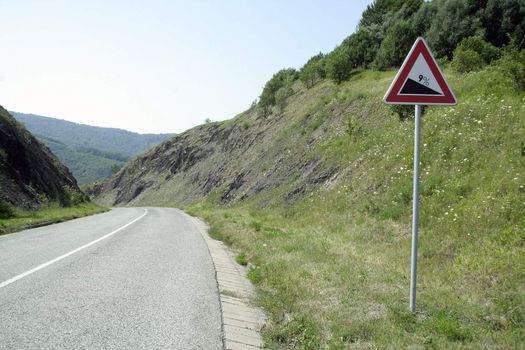 empty road, left curve, nine percent descent, nature scenery