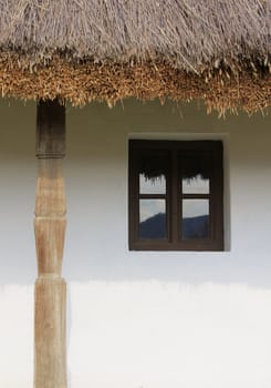 Nearby a farmer's house and window details.