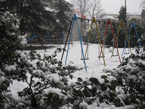 playground in the snow in switzerland                               
