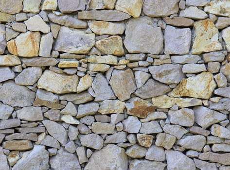Layered stone wall structure and pattern.
