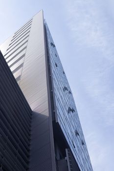 Corporate buildings in perspective on sky background