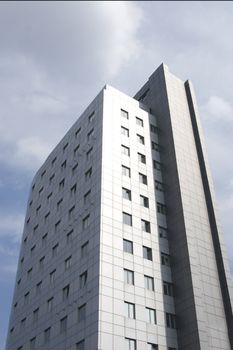 Corporate buildings in perspective on sky background