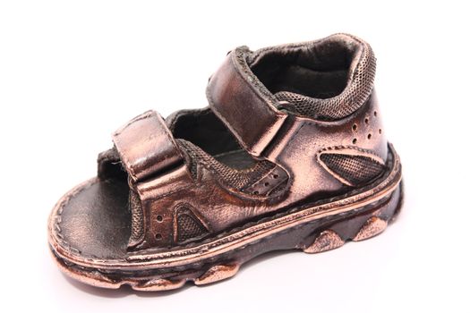 photo of a bronzed baby shoe