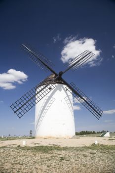white mill on the country of la mancha in spain