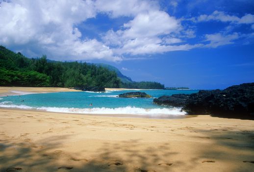 A short hike is required to reach secluded Lumahai Beach on the north shore of Kauai, Hawaii.