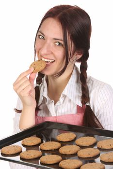 beautiful housewife eating a slice of chocolate cake 