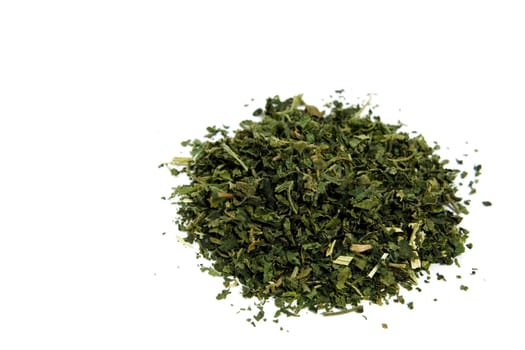 dry nettle tea on white background