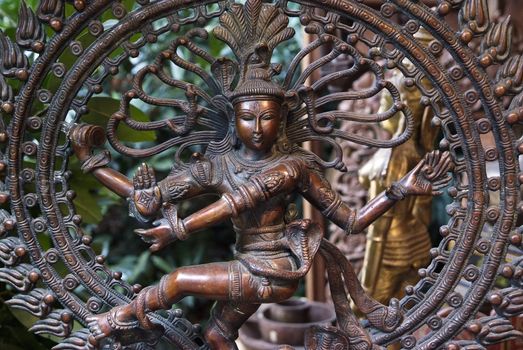 The Hindu Lord Shiva performing the cosmic dance.