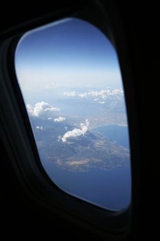 airplane window view of the mediterranean coast