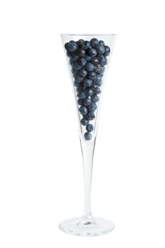 blueberry in a champange glass, isolated