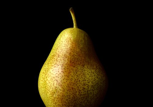 Barlett pear against black background