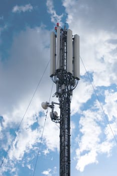 Cellular communication antena and blue sky background