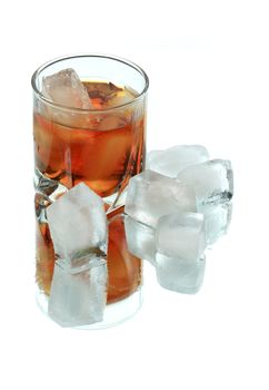 Glass of whiskey with ice cubes on white background with clipping path