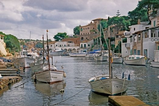 The sea inlet at Cala Figuera in Mallorca, Spain, provides a perfect harbour for small boats.