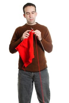 A man knitting something, isolated against a white background