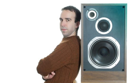 Horizontal image of a man leaning against a large speaker, isolated against a white background