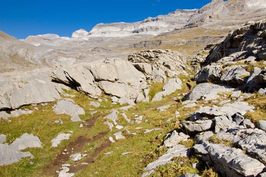 Mountain path to Monte Perdido in Ordesa National Park - Spain, Autumn time - Pyrenees.