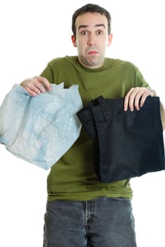 A man trying to decide between cloth or plastic bags, isolated against a white background
