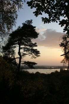 Sunset view to river Elbe (and the island Neßsand) from Sven-Simon-Park/Falkenstein in Hamburg-Blankenese, Germany.