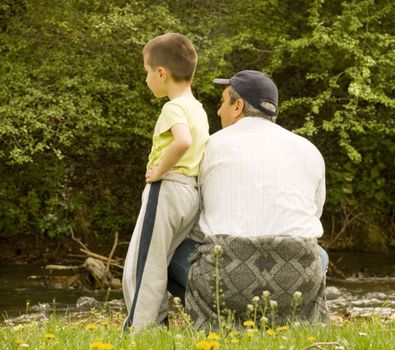 grandpa and grandson enjoying the sun