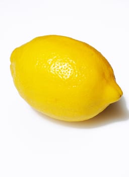 Yellow Lemon on a light background.
