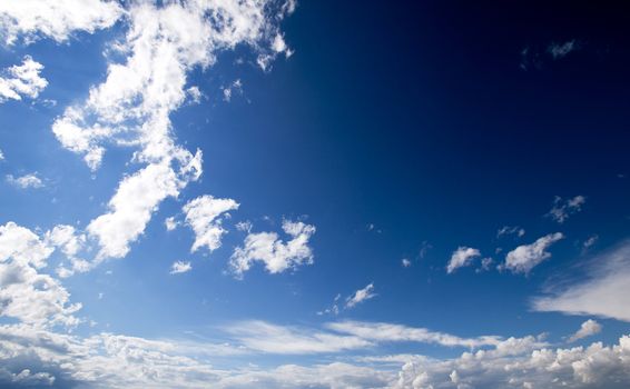 A blue sky with clouds background