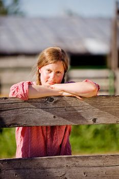 A country farm girl taking a break