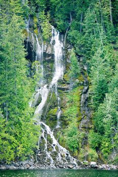 A beautiful waterfall going down a mountain side