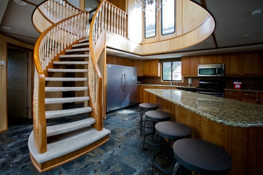 A luxury yacht interior - kitchen and second floor