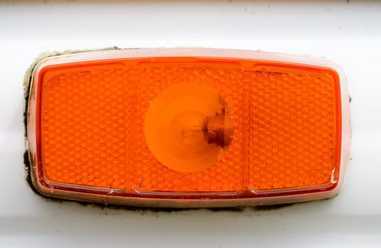 An orange side light on a trailer