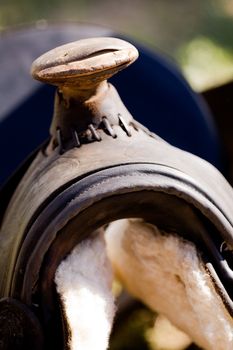 A detail of an old worn saddle