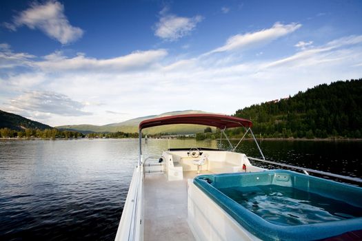 A luxury house boat on a beautiful lake