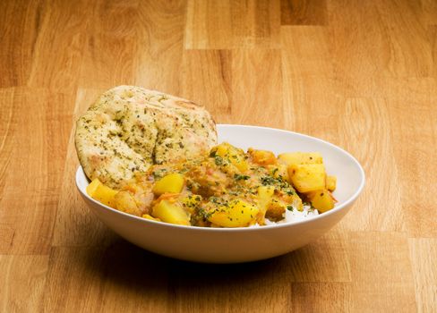 An Indian meal - Potato curry with Lentis and Naan bread