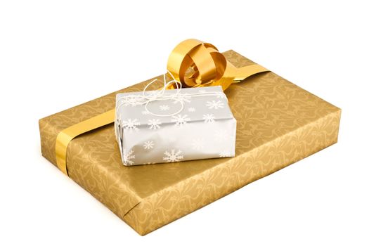 Silver and golden gift boxes isolated on white