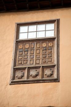 carved wood window at icod in tenerife spain